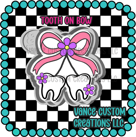 Tooth on Bow Freshie Mold